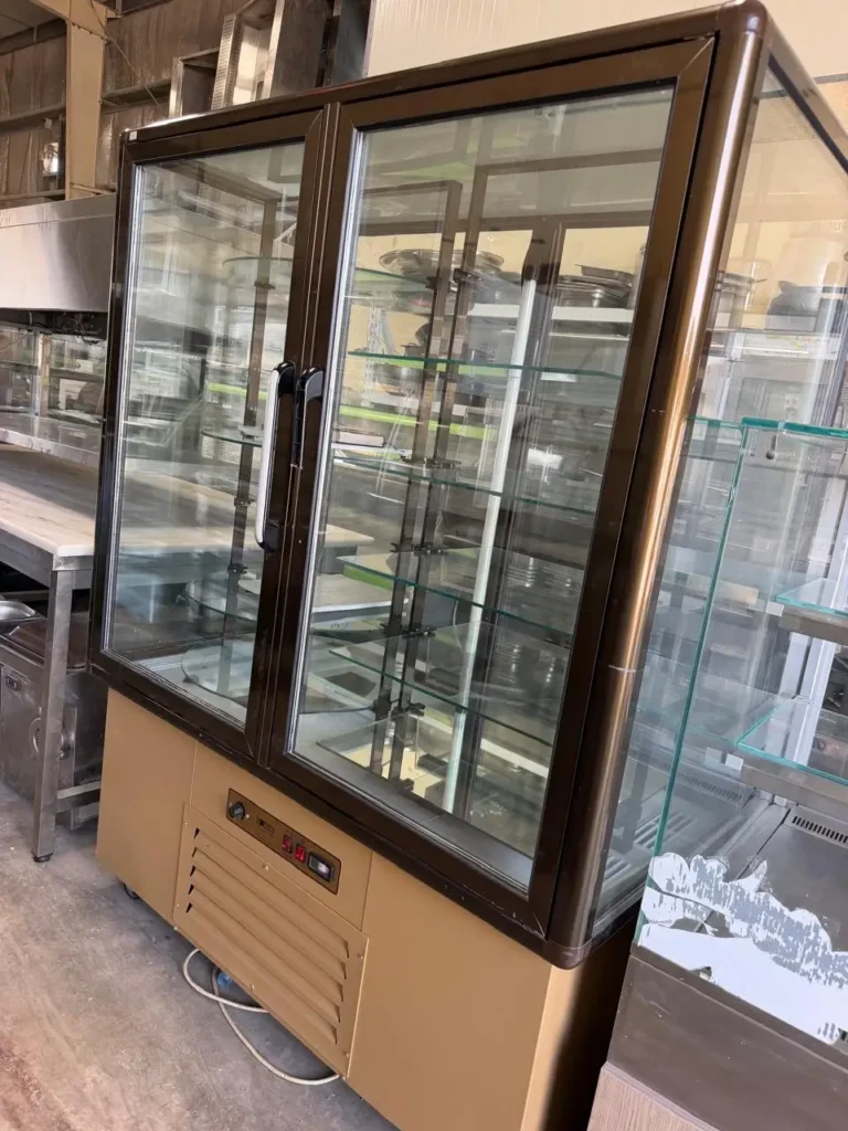 commercial vertical refrigerated cake display showcase featuring glass doors and adjustable shelves